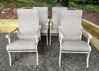 Four Outdoor Arm Chairs