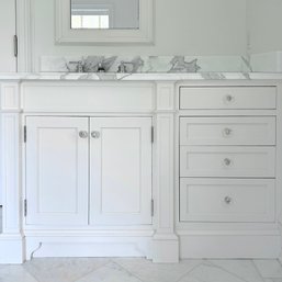 A White Marble Bathroom Sink And Vanity With Waterworks Faucet - Bath 3