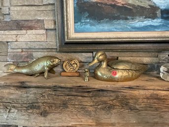 A BRASS BIRD, DUCK, AND A BROOK GREEN GARDENS MEDALLION