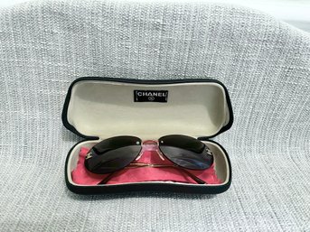 Chanel Black Rimless CC Aviator Sunglasses.