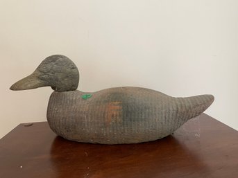 A CARVED WOODEN DUCK DECOY