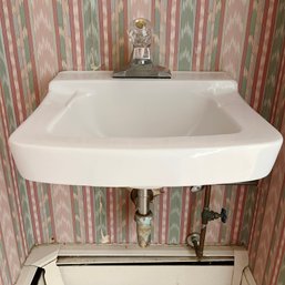 A White Wall Mount Sink - Powder Room