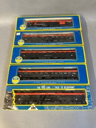 Five NIB AHM HO Scale Trains: New Haven Observation, Pullman, Diner & Baggage Cars