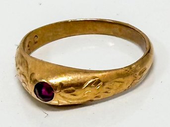 An 18K Gold Child's Ring With Gorgeous Inset Amethyst Stone