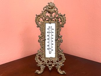 An Antique Enamel And Bronze Thermometer