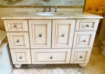 A Custom Paneled Hard Wood Bathroom Vanity With Onyx Top And Kohler Undermount Sink