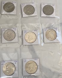 Eight Uncirculated Eisenhower Dollar Coins