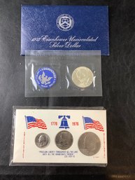 1973 Eisenhower UNC Silver Dollar & Set 1776-1976 Ike Dollars, Kennedy Half Dollar And Washington Quarter