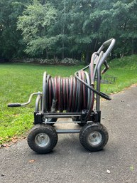 A 4 Wheel Hose Caddy - With Hose - Belt Drive Crank