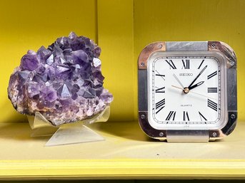 A Vintage Geode Bookend And Brass Clock