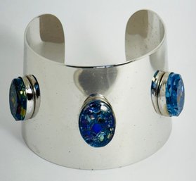 SIGNED SARAH COV WIDE SILVER TONE CUFF WITH PRETTY BLUE/PURPLE OVAL GLASS ACCENTS BRACELET