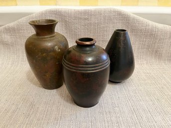 Group Of Three Metal Bronzed Vases