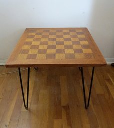 A Hand Crafted Game Table With Hairpin Legs