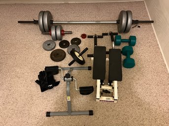 Lot Of Weights And Exercise Equipment