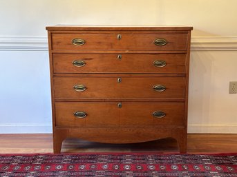 A Beautiful Early 19th Century Hepplewhite Chest Of Drawers In Cherry With Brass Hardware