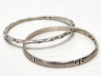 A Pairing Of Vintage Sterling Silver Bangles