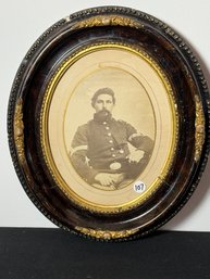 A VICTORIAN FRAMED PHOTOGRAPH OF A CIVIL WAR SOLDIER