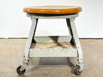 An Industrial Chic Rolling Stool