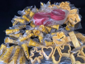 Yellow Plastic Cookie Cutters & Juice Extractors
