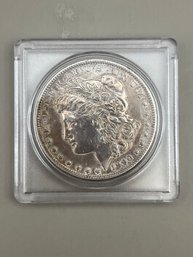 1890 Morgan Silver Dollar In Plastic Case