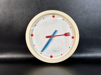 A Whimsical Wall Clock By Empire With Fork & Knife Hands