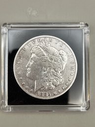 1883 Morgan Silver Dollar In Plastic Case