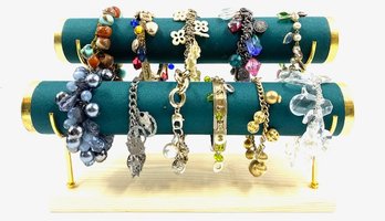 Grouping Of 11 Charm Style/jangle Bracelets