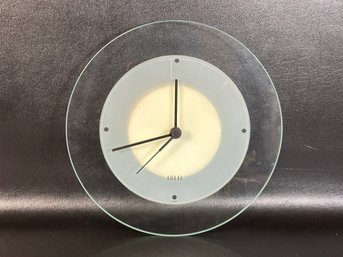 A Modern Glass Plate Wall Clock By Umbra