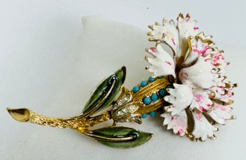 SIGNED CORO ENAMEL AND BLUE & WHITE STONE FLOWER BROOCH