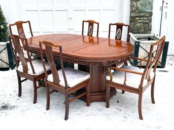 A Stunning Chinese Mahogany Extendable Dining Table And Set Of 8 Chairs
