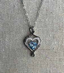 Beautiful Sterling Silver Chain With A Blue Topaz Color And CZ Stones Heart Pendant