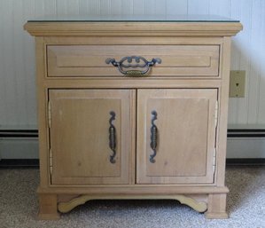 A Pair Of Light Colored Thomasville Night Stands With Glass Tops