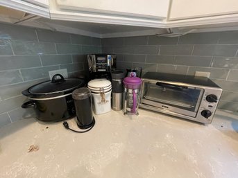 BREAKFAST NOOK LOT INC. COFFEE MAKER, TOASTER OVEN, CROCK POT, COFFEE GRINDER, ETC.