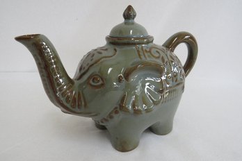 A Stoneware Elephant Tea Pot By Pier 1 Imports