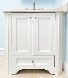 An Attractive Corner Vanity With Custom Wood Cabinets, Kohler Fittings, And A Granite Top