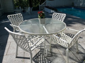 Round Glass & Aluminum Patio Table With Four Mallin Chairs