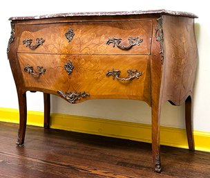 A 19th Century Italian Modern Marble Top Bombe Form Dresser