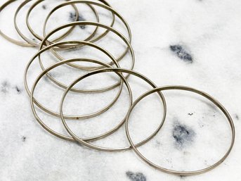 An Assortment Of Sterling Bangles