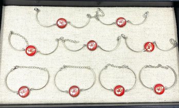 Grouping Of Kansas City Silvertone Overstock Bracelets