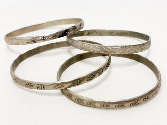 An Assortment Of Vintage Sterling Silver Bangles