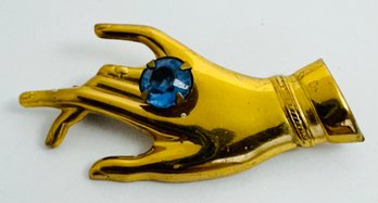 VINTAGE GOLD TONE HAND WITH BLUE RHINESTONE BROOCH