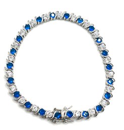 Beautiful Sterling Silver Blue Topaz Color And Clear Stones Tennis Bracelet