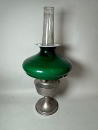 AN ALADDIN OIL LAMP W/ GREEN EMERALDITE SHADE