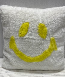 A Smiley Face Decorative Pillow