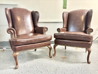 Pair Of Leather Wing Chairs With Nailhead Trim