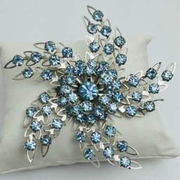 SILVER TONE BLUE RHINESTONE PINWHEEL BROOCH