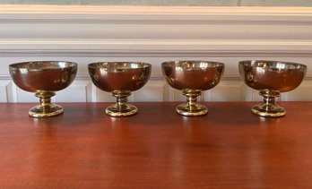 Group Of Four Gold Colored Glass Bowls