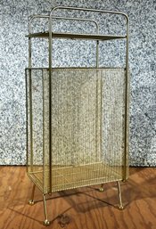 A Vintage Mesh Magazine Stand