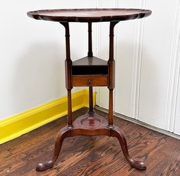 An Antique Mahogany Occasional Table