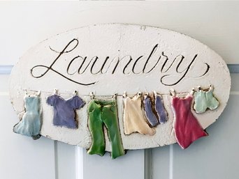 A Hand Painted Laundry Sign